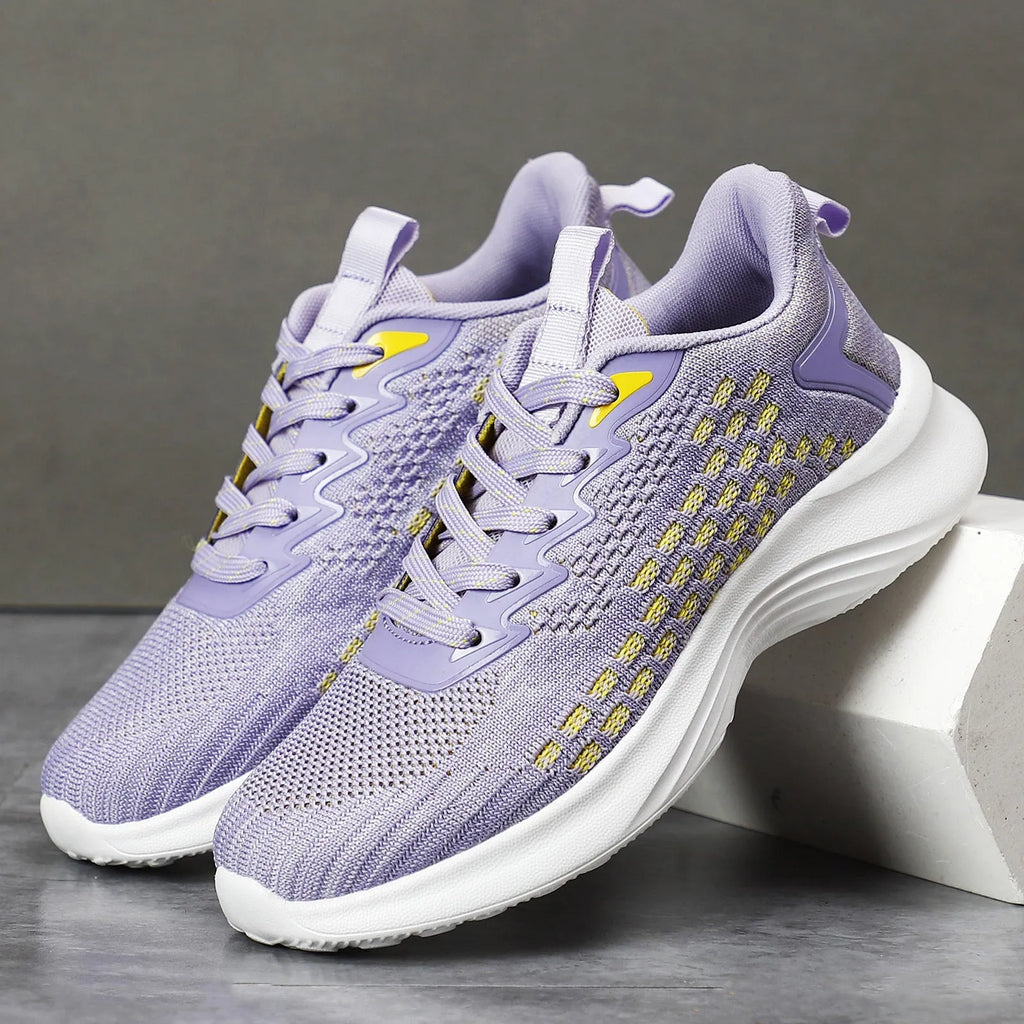 Lavender purple women's Flyknit running shoes with mesh upper and striped pattern on an EVA sole.