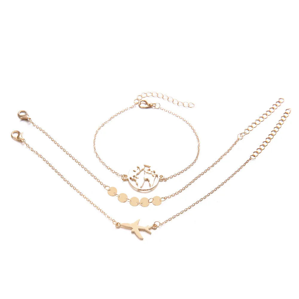 Set of three bohemian-style women's bracelets with aircraft map designs on heart-shaped alloy charms