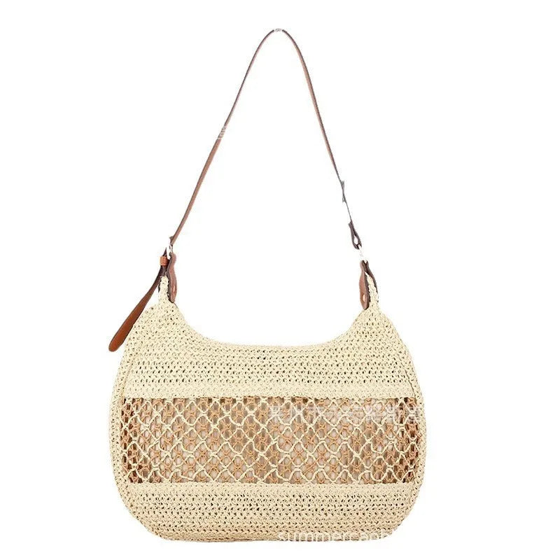 Khaki coloured straw cross body bag with a square shape and an external sandwich pocket.