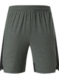 Men's forest green spandex casual shorts with a mid-waist and short-length fit.