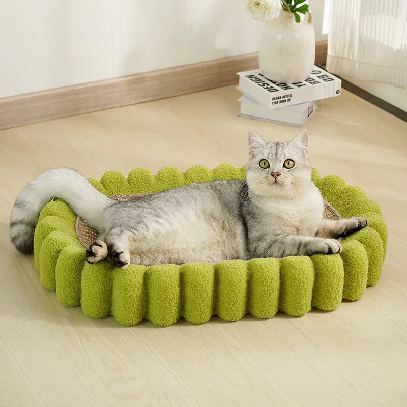 Green oval sisal cat scratch pad bowl serving as a cat bed and scratcher.