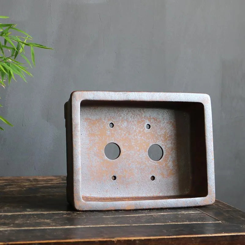A rectangular purple sand bonsai pot shown in two sizes, for pine, cypress or boxwood trees.