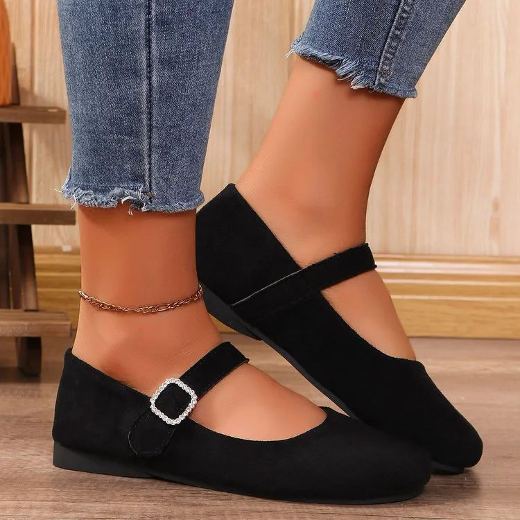 Black canvas women's fisherman shoes with rubber soles shown in low-top casual design