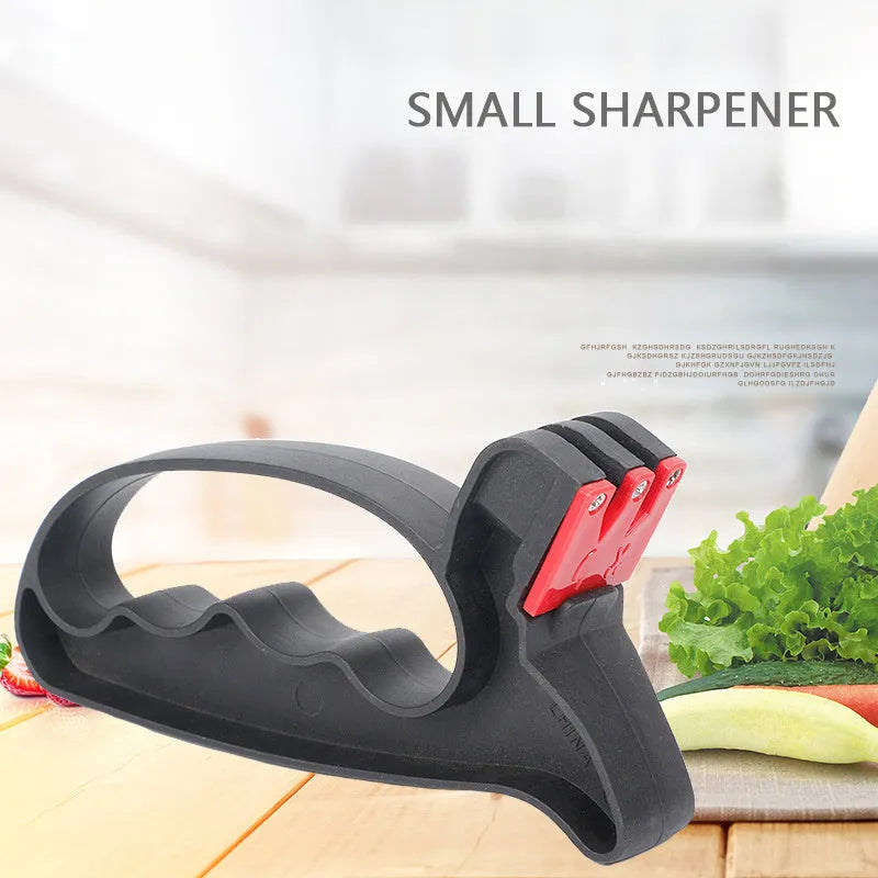 Black handheld knife and scissor sharpener with a tungsten steel blade