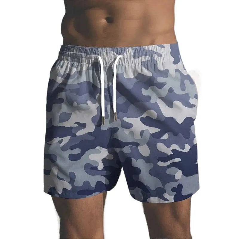 Men's polyester beach shorts with elastic waistband in various printed colours