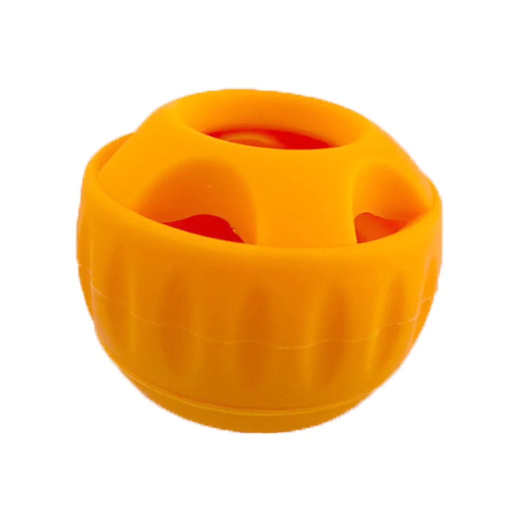 Dog silicone slow meal ball and tray set in green and orange on a light background