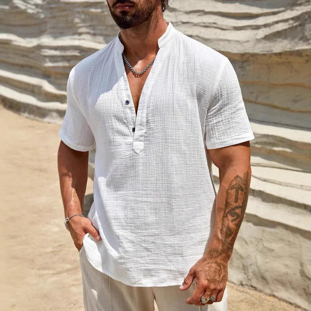 Men's solid colour short-sleeve shirt with a stand collar in a lightweight fabric.