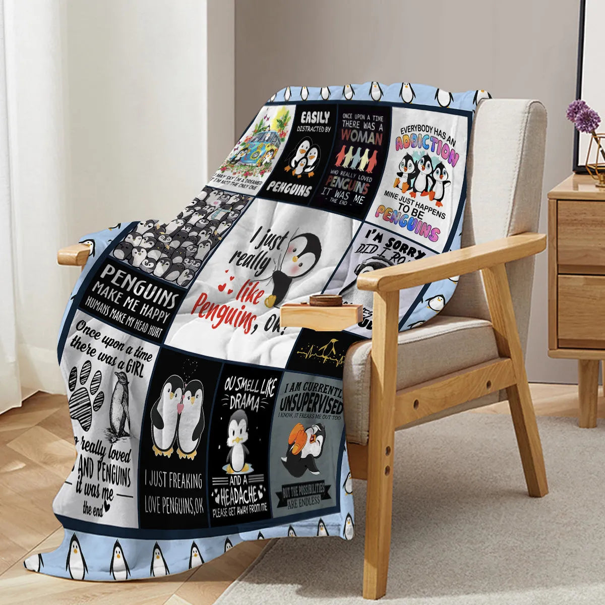 Multicolored flannel velvet blanket with penguin patterns, 130x150cm, on a sofa