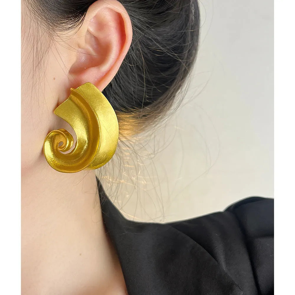 Geometric alloy ear studs with gold or silver electroplated finish measuring 5cm