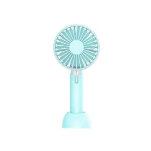 Blue handheld USB mini electric fan with three-speed control on a desk.