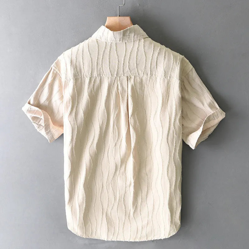 Men's pure cotton casual shirt in apricot colour with short sleeves and a loose fit.
