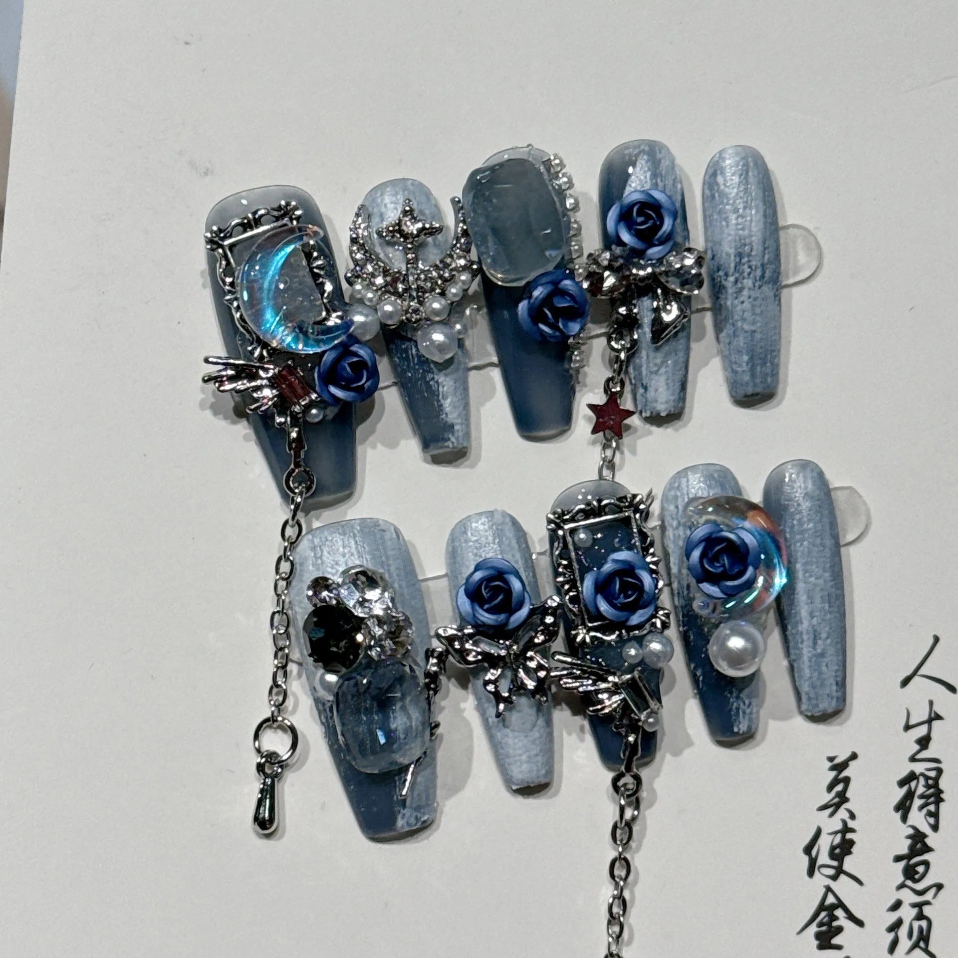 Heavy industry night blue artificial nails with 3D rose and tulip designs, showing sizes XS, S, M, L.