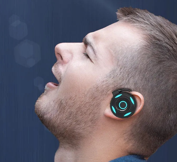 Black and white Bluetooth gaming earphones with hanging design and USB charging port