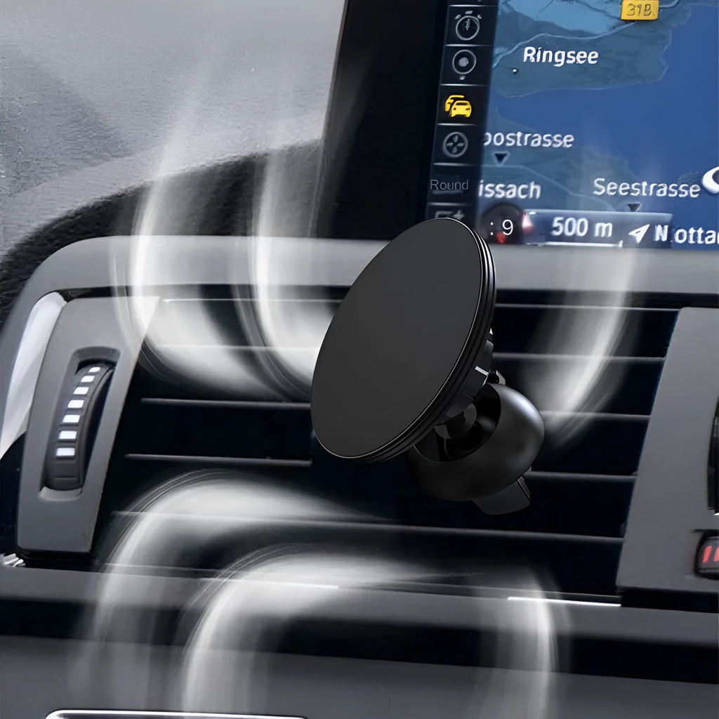Black aluminium alloy magnetic car phone holder attached to vehicle air vent