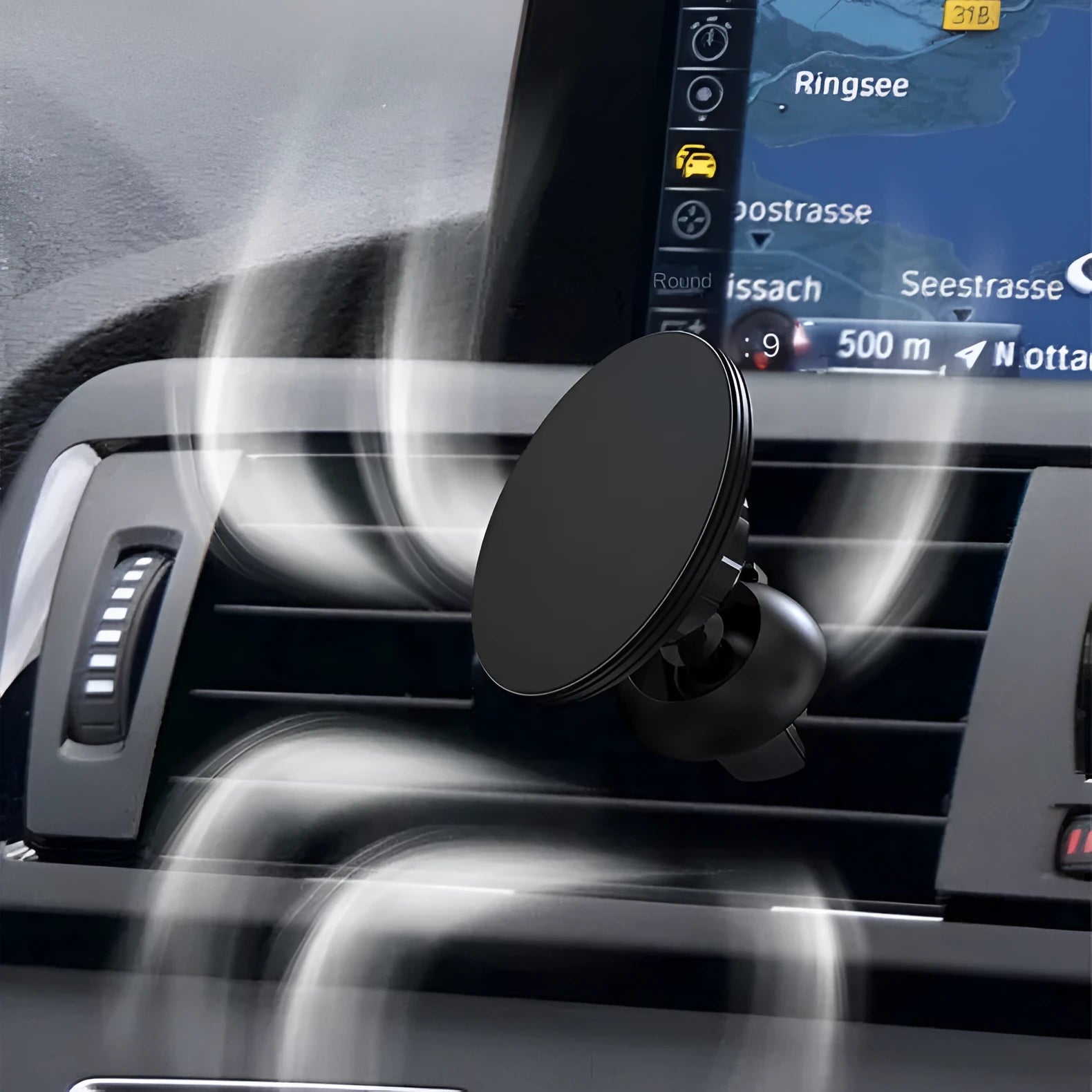 Black aluminium alloy magnetic car phone holder attached to vehicle air vent