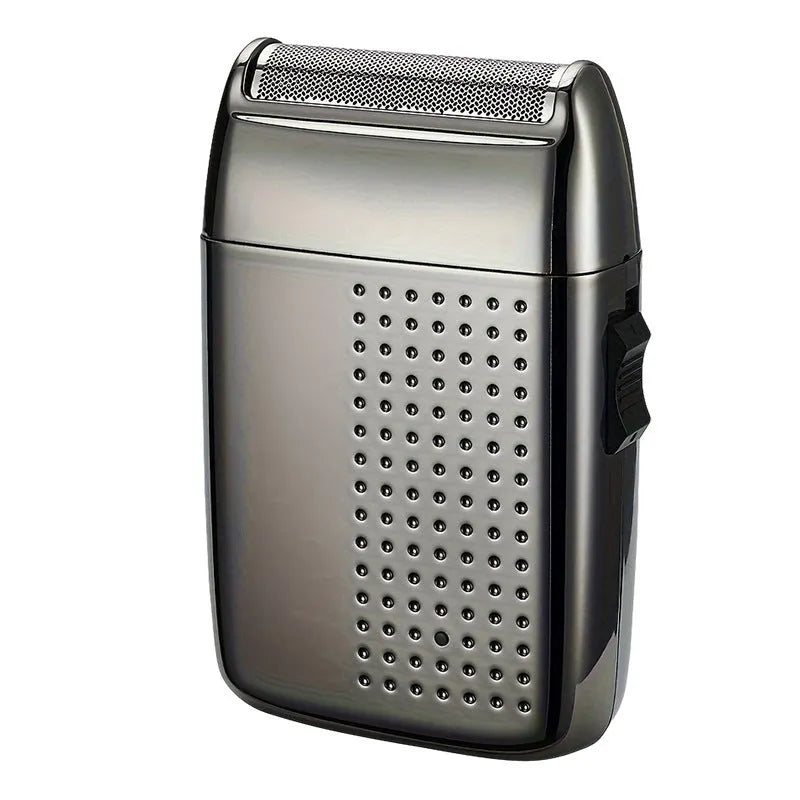 Compact reciprocating travel electric shaver in gold or tarnish, rechargeable with 60 minute battery and removable cutter head