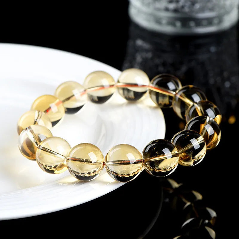 Natural citrine scattered beads ball bracelet showing polished beads in 7A and 6A colour grades.