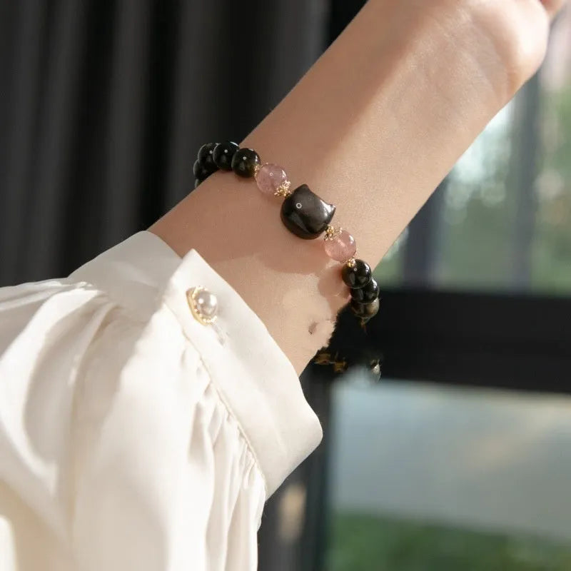 Black natural obsidian stone bead bracelet with silver kitty charm and sliding knot adjustment