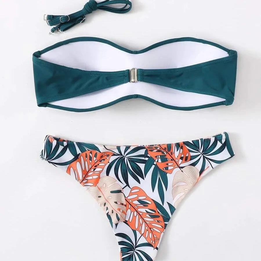 Split push up hard bag bikini swimsuit with matching briefs in multiple colours on a mannequin.