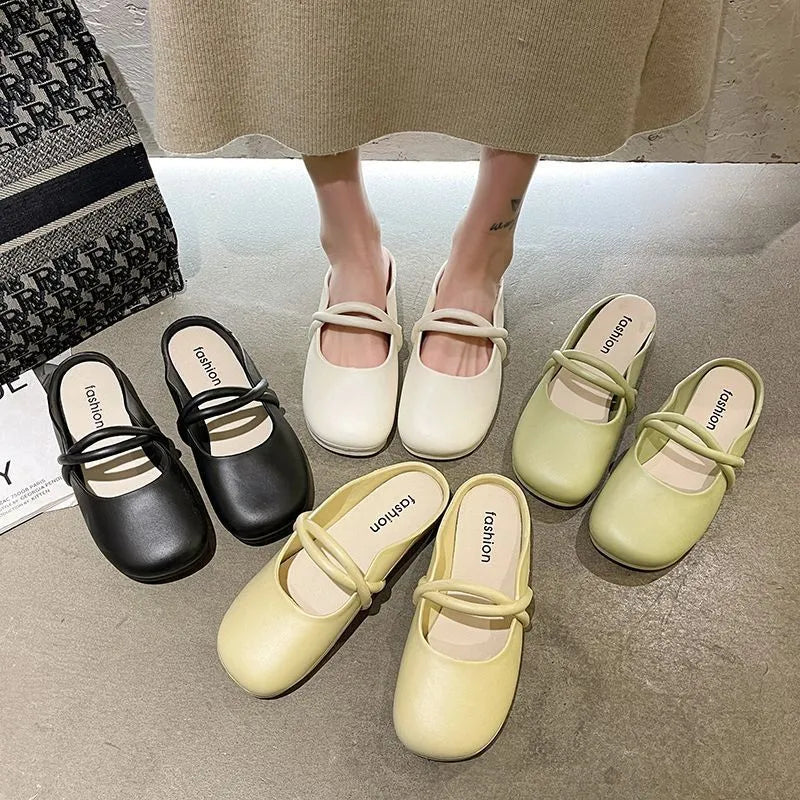 Women's plastic baotou flip flop sandals in green, shown from the side.