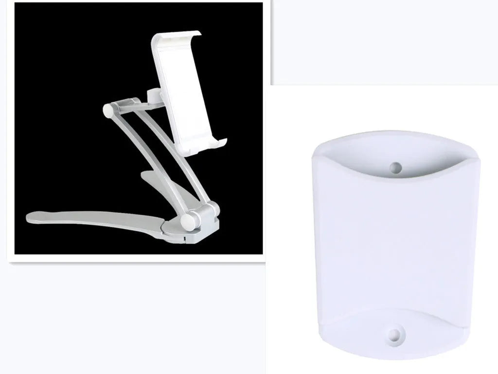 Silver aluminium alloy desktop stand holding a tablet at an angle, with adjustable clips and a white mounting base.