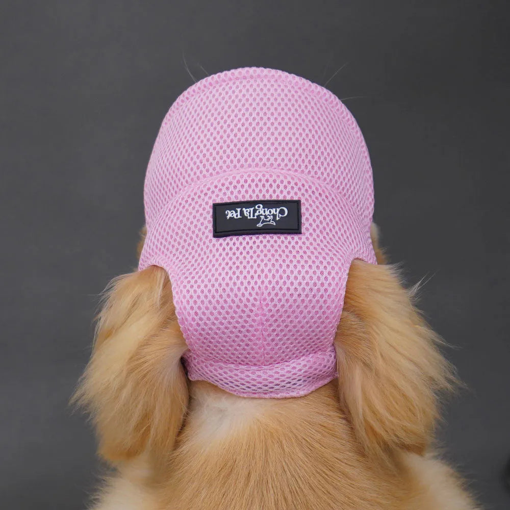 Breathable sandwich net dog hat with ear holes in green or pink, sizes XS to XL