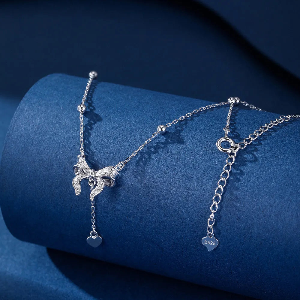S925 pure silver butterfly heart pendant on an adjustable O-ring clavicle chain necklace.
