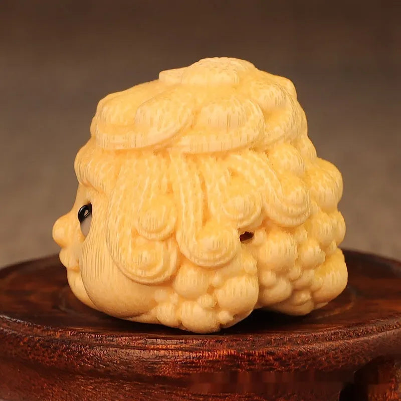 Solid bamboo carving of a cute golden toad Princess ornament for home display.