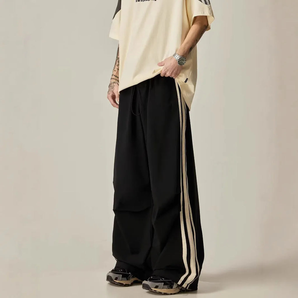 Black wide leg climbing trousers for men with high waist and straight leg design
