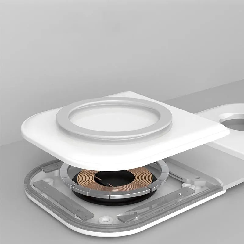 White folding dual magnetic desktop wireless charger with two USB Type C ports on a desk