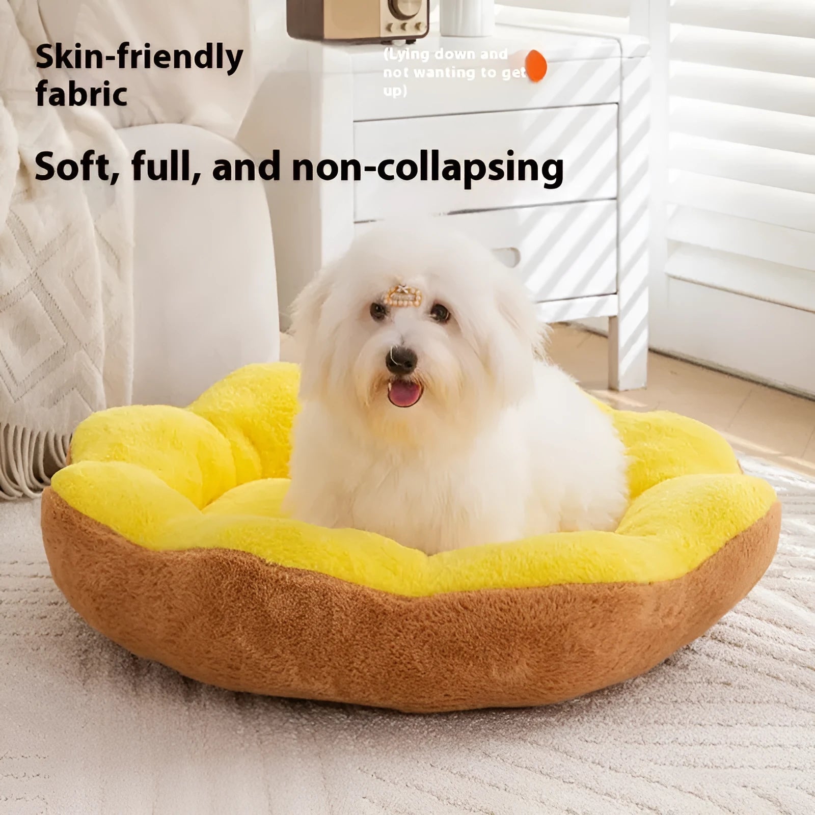 Soft plush round cat bed with a removable cover in a brown grey colour, shown on a floor.