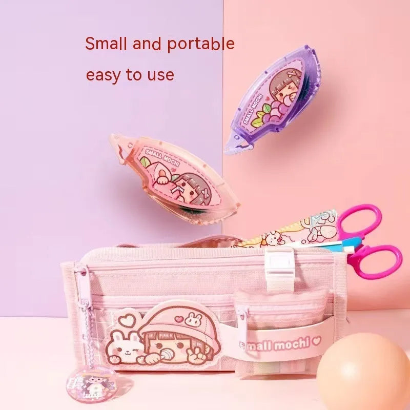 Hand Account Dotting Glue dispenser with high viscosity double-sided adhesive dots in cute fruit juice colours.