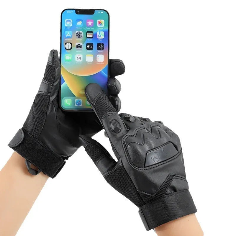 Men's black tactical training gloves with touch screen fingertips on a hand.