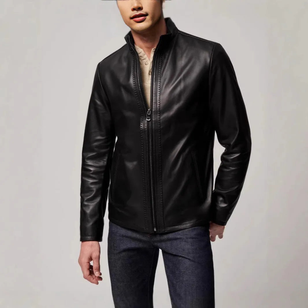 Man wearing a black retro-style leather-look jacket made from polyester fibre.