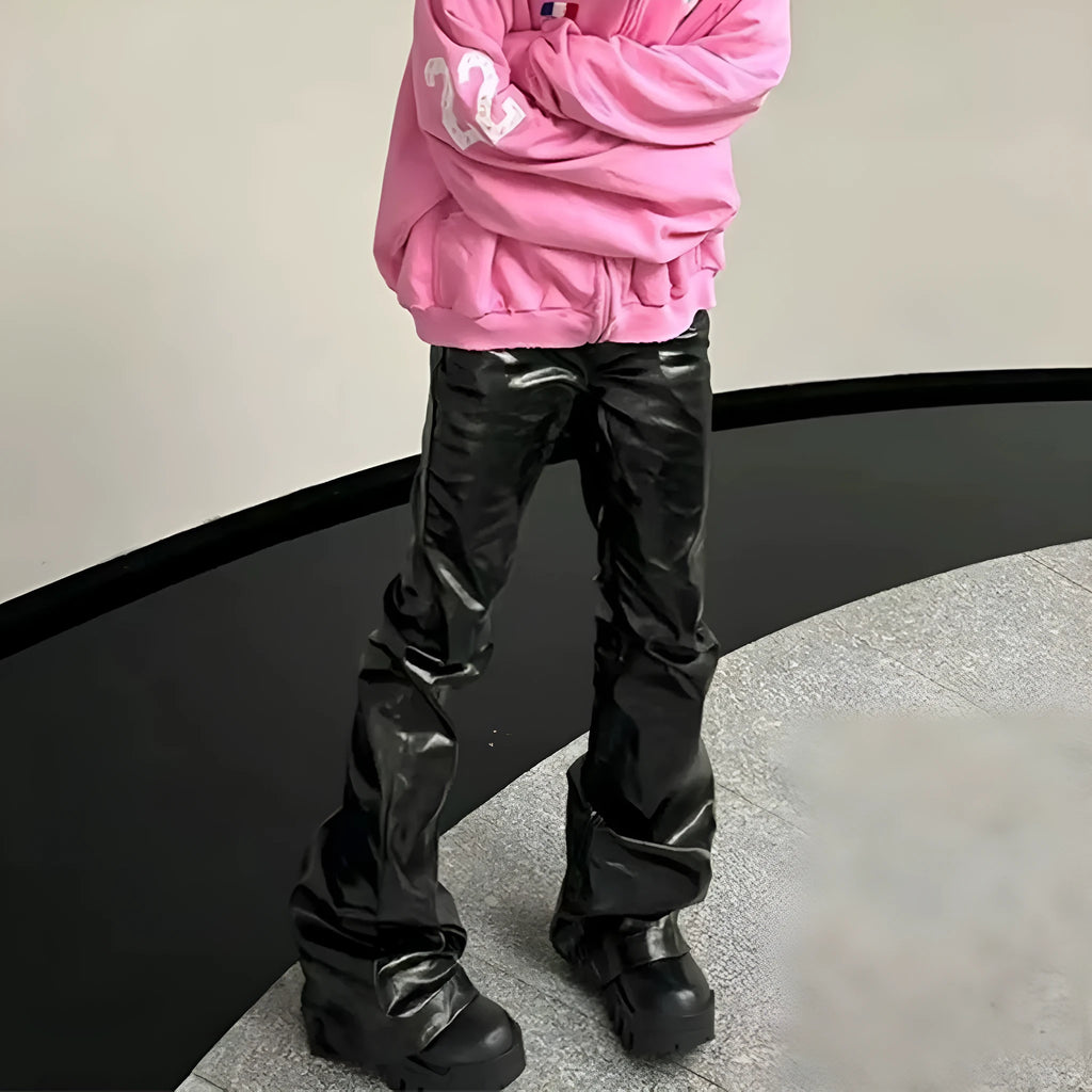 Black shiny patent leather skinny jeans with a straight-leg cut and mid waist