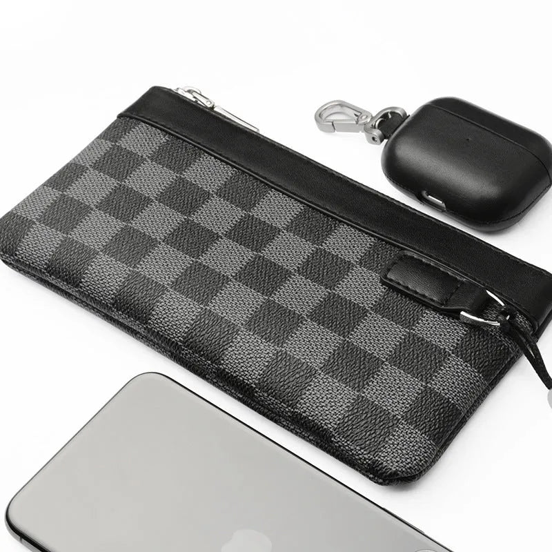 Black genuine leather men's clutch wallet showing first-layer cowhide texture and rectangular 20x10cm shape