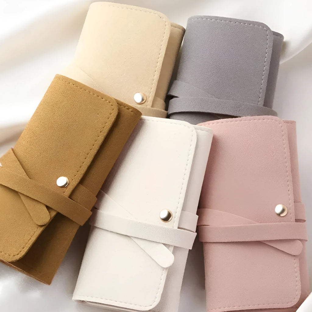 Soft brown leather jewellery storage pouch for earrings and rings, shown at 12cm square size.
