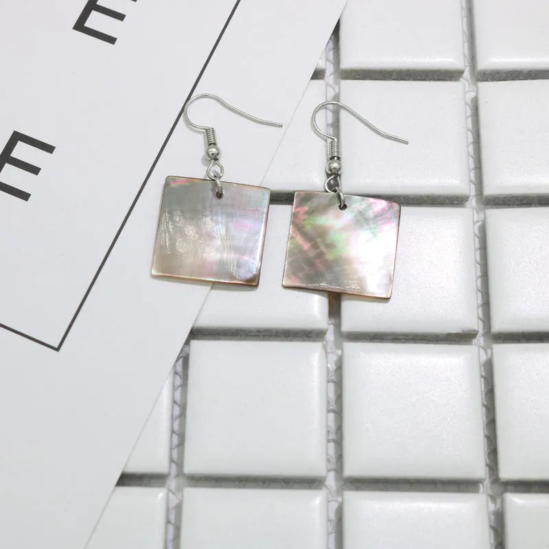 Geometric shell drop earrings in Square Panther or Rectangular Shell designs