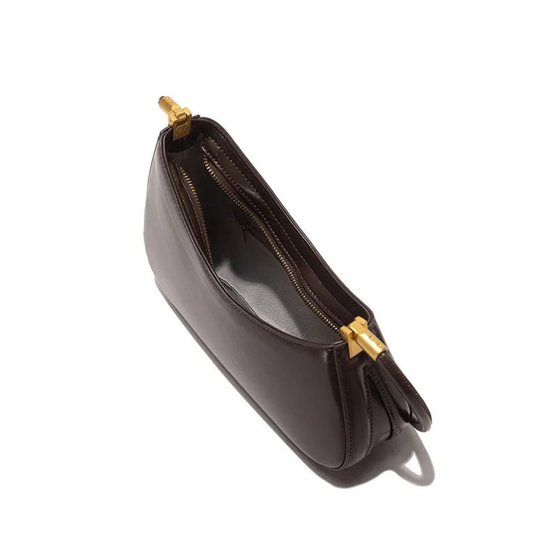 Women's retro PU leather underarm bag in oval shape with single shoulder strap and sandwich pocket