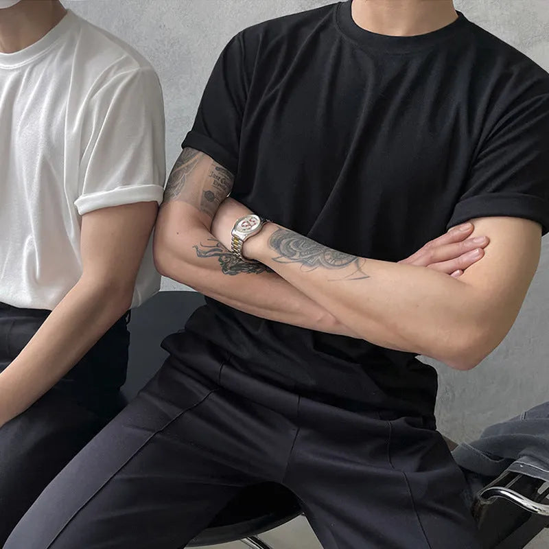 Men's black slim fit cotton T-shirt with round neck and half sleeves on white background