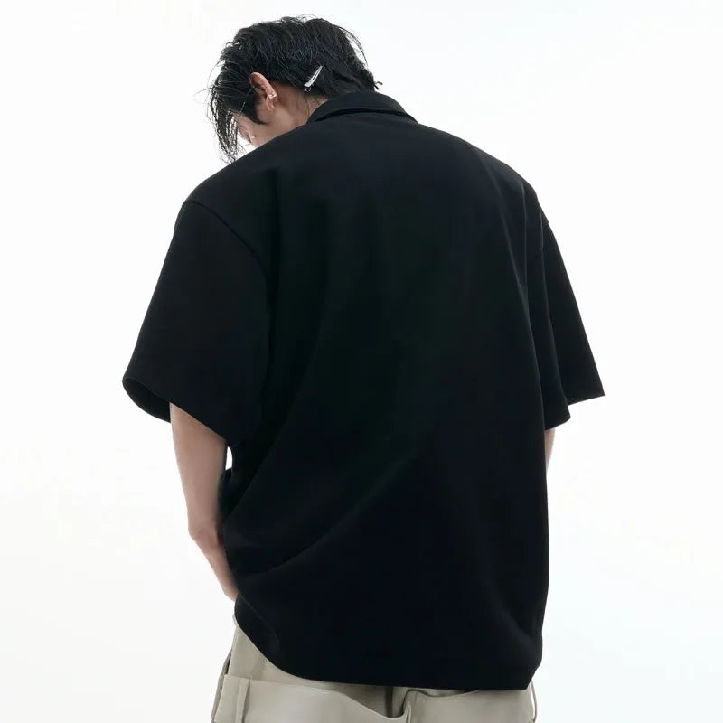 Men's deconstructed multi-collar polo shirt with geometric pattern in grey.
