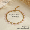 Gold-plated stainless steel double-layer necklace with colourful geometric beads on a white background