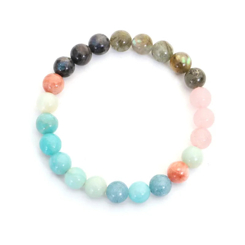 Bohemian jewellery set with colourful stone beads and tassel pendants showing necklace and bracelet pieces