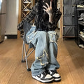 Blue high-waist wide-leg denim jeans with straight-leg fit on hanger