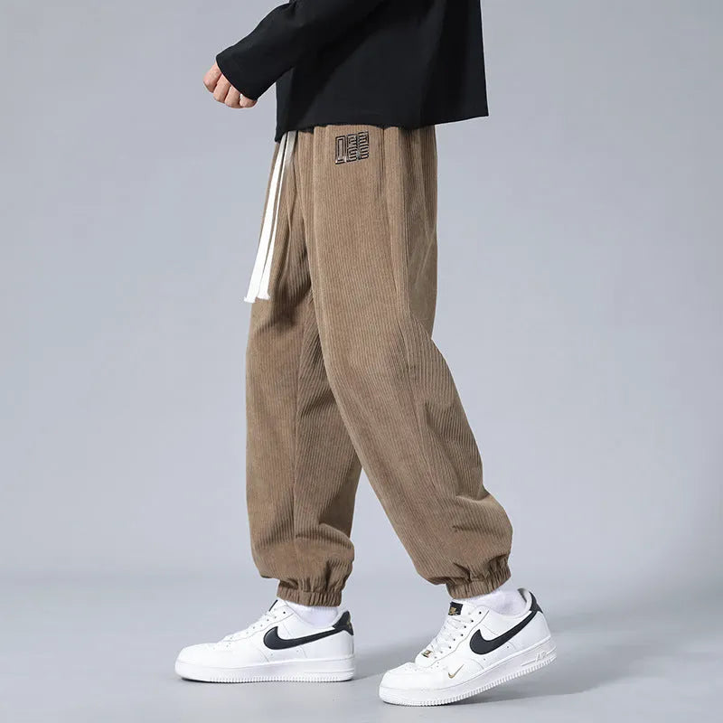 Men's workwear casual sports trousers in dark gray with letter print, polyester fibre, side view