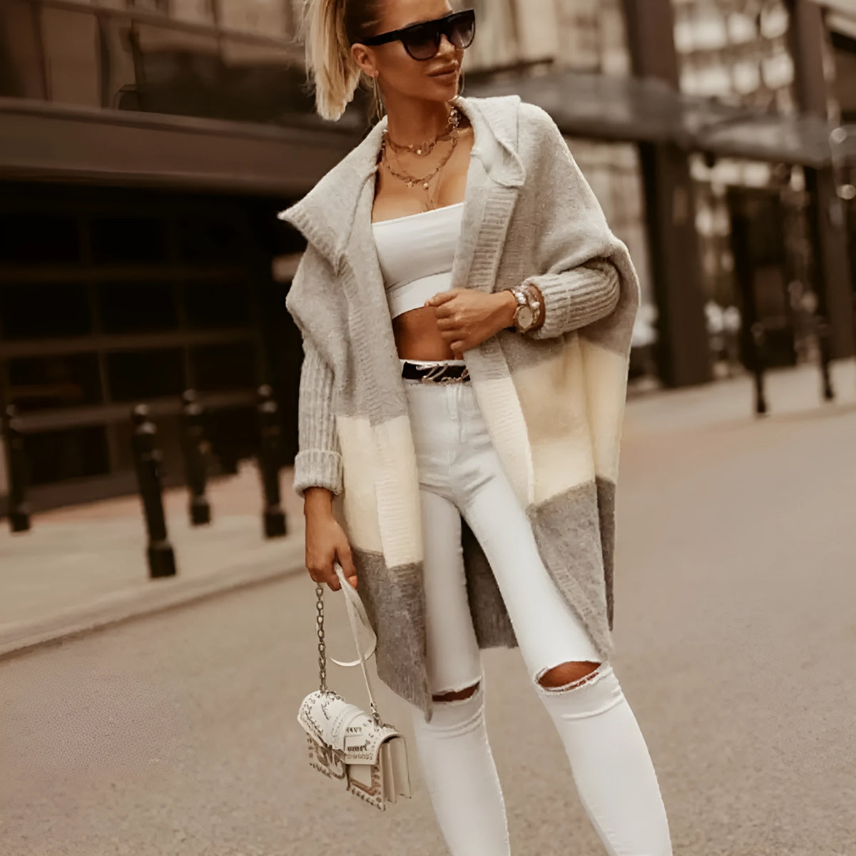 Women's hooded knit cardigan coat in pink or grey with colour matching pattern, long sleeves, loose fit, 65cm length