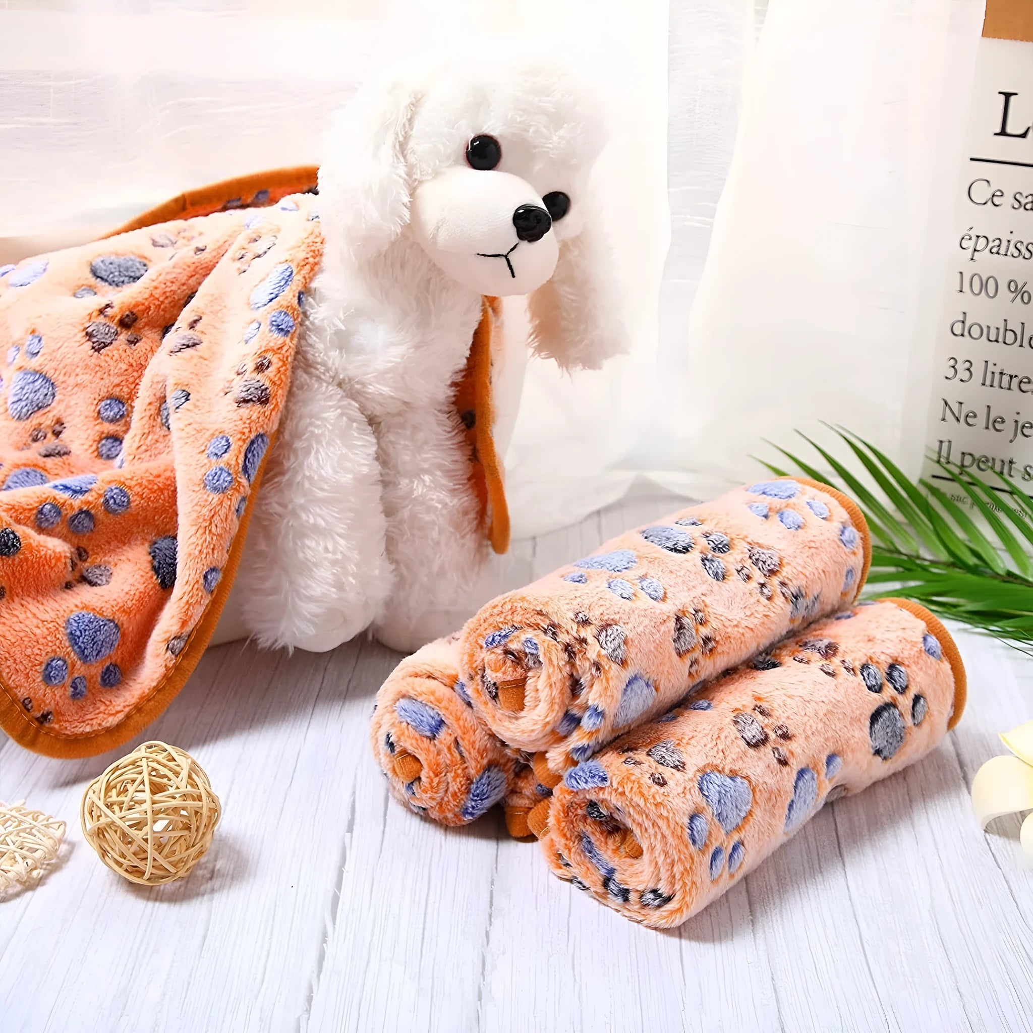 Coral fleece dog blanket with dog's paw pattern in selected colour and size