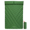Double size inflated air mattress in army green colour with an attached pillow, on a grass surface.