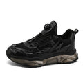 Men's black casual shoes with rotating button fastening and a low platform sole.