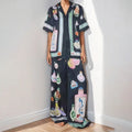 Black women's cardigan and trousers set with cartoon animation pattern